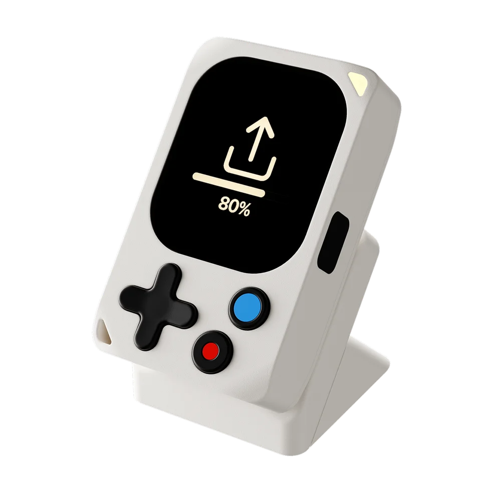 Kode Dot on its dock, receiving a firmware upload